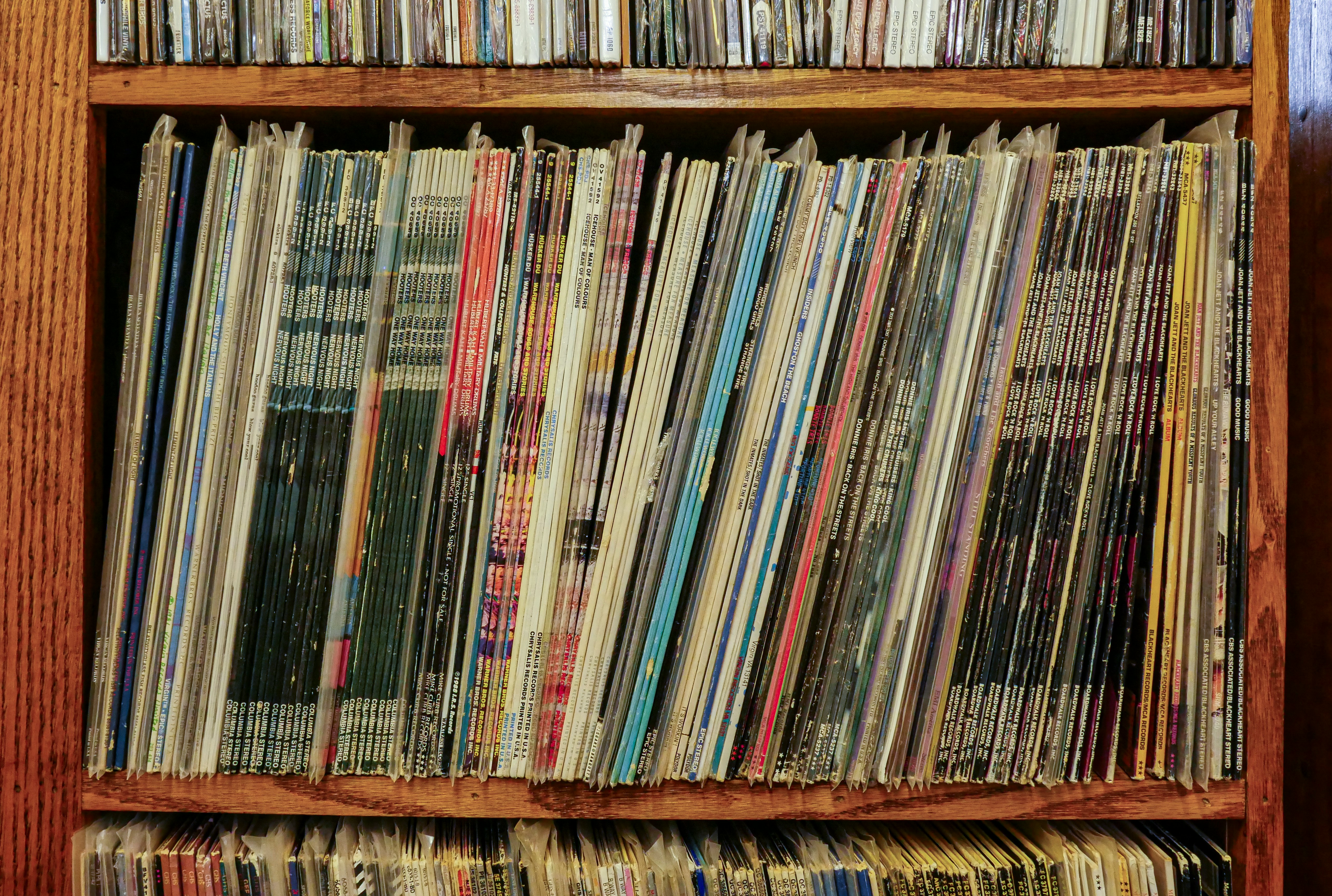 books on brown wooden shelf